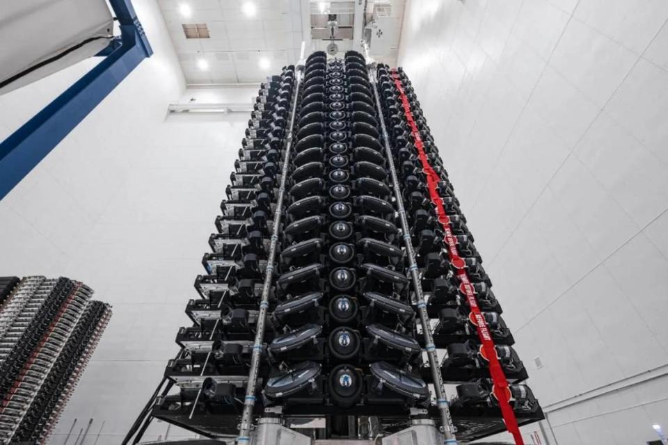 Starlink satellites are stacked for launch aboard a SpaceX Falcon 9 rocket.