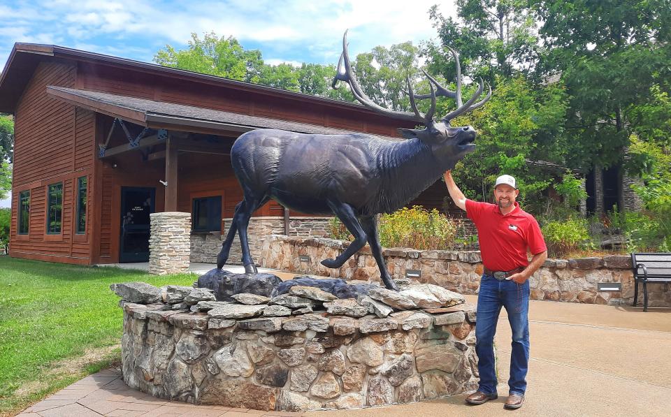 Ben Porkolab, Keystone Elk Country Alliance (KECA) conservation education coordinator, welcomes people to experience the visitor center and the wild elk that live in the region.