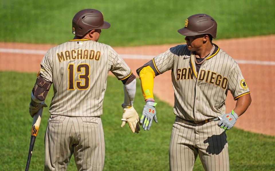 Padres teammates Manny Machado, left, and Juan Soto were the top third baseman and outfielder in this year's NL LABR draft.