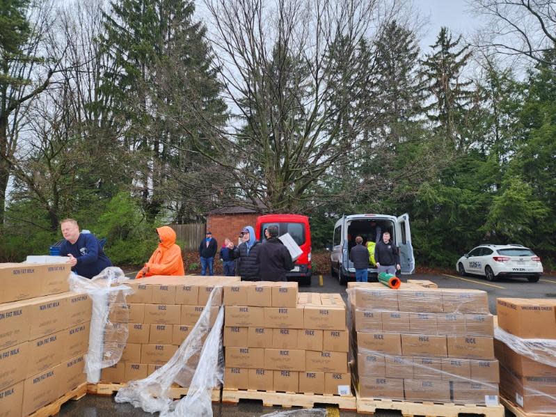 Salvation Army of Salem volunteers work to unload and sort a donation of food from The Church of Jesus Christ of Latter-Day Saints. The church donated 20,000 pounds of food to help alleviate food insecurity in Columbiana, Mahoning and other nearby counties.