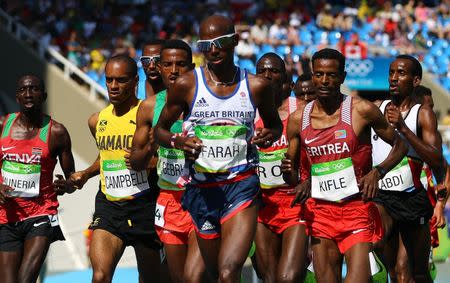 2016 Rio Olympics - Athletics - Preliminary - Men's 5000m Round 1 - Olympic Stadium - Rio de Janeiro, Brazil - 17/08/2016. Mo Farah (GBR) of Britain competes. REUTERS/Kai Pfaffenbach
