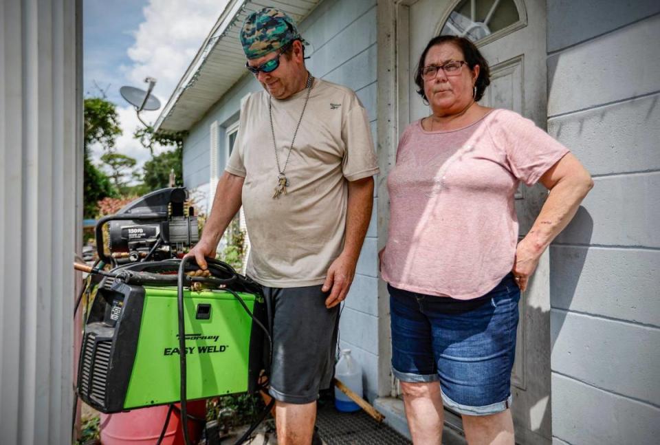 Danny Hoffman and Rene Hoffman prepare to evacuate their home in Steinhatchee, Florida in preparation for Hurricane Idalia on Tuesday, August 29, 2023.