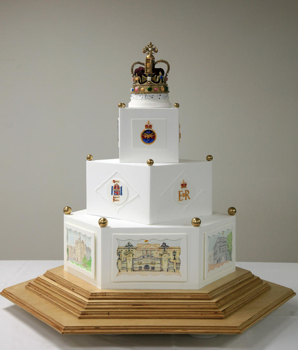 WINCHESTER, ENGLAND - MAY 09: (EMBARGOED UNTIL 0001 MAY 17, 2012) The Queen's Diamond Jubilee cake is seen at the Defence Food Services School at Worthy Down camp on May 9, 2012 near Winchester, England. The tiered cake - designed to reflect the themes of the Silver, Gold and Diamond Jubilees as well as the contributions of all three Services - weighs approximately 70kg and has taken more than 500 hours to complete. The cake will be unveiled to Her Majesty and her guests at the Diamond Jubilee Parade and Muster at Windsor Castle on Saturday May 19. (Photo by Matt Cardy/Getty Images)