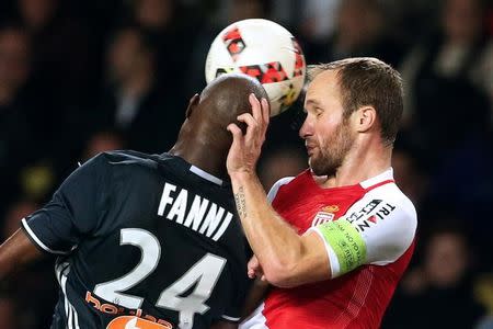 Football Soccer - Monaco v Marseille - French Ligue 1 - Louis II stadium, 26/11/16. Monaco's Valere Germain challenges Marseille's Rod Fanni. REUTERS/Eric Gaillard