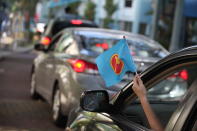 Residents showing their support from their cars.