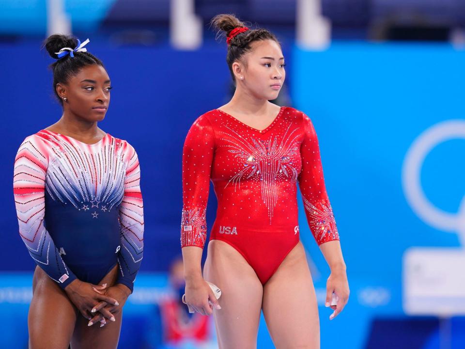 Simone Biles (left) and Suni Lee at the Tokyo Olympics.