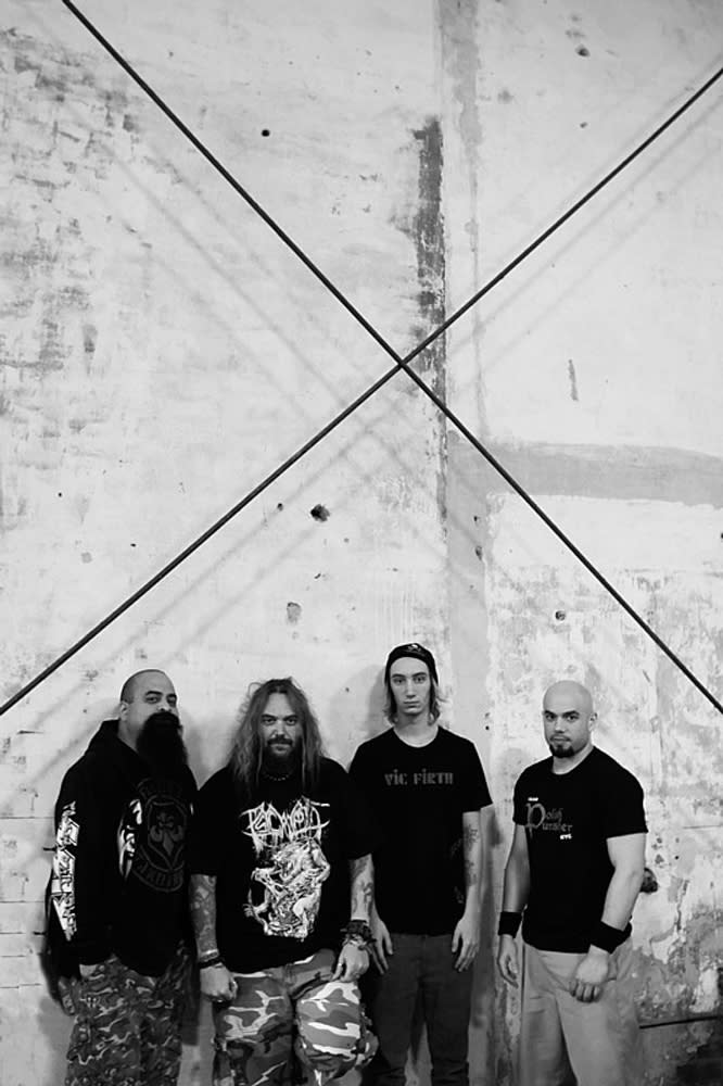 This undated photo provided by Oasis Management shows Soulfly band members, Tony Campos, Max Cavalera, Zyon Cavalera and Marc Rizzo, in Seattle. The band's ninth studio album “Savages,” was released last week by Nuclear Blast Records. (AP Photo/Oasis Management, Charlene Tupper)