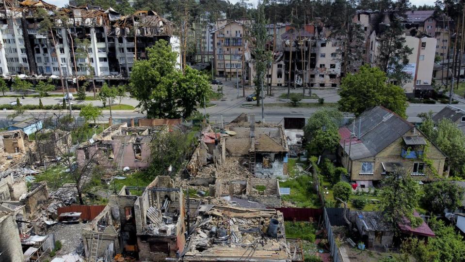 <span class="caption">Damaged buildings ruined by attacks are seen in Irpin, on the outskirts of Kyiv, Ukraine in May 2022. </span> <span class="attribution"><span class="source">(AP Photo/Natacha Pisarenko)</span></span>