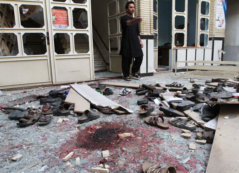 <p>A relative inspects after an overnight suicide attack at a mosque in Herat, Afghanistan, Aug. 2, 2017. (Photo: Mohammad Shoib/Reuters)Relatives inspect after an overnight suicide attack at a mosque in Herat, Afghanistan, Aug. 2, 2017. (Photo: Mohammad Shoib/Reuters) </p>