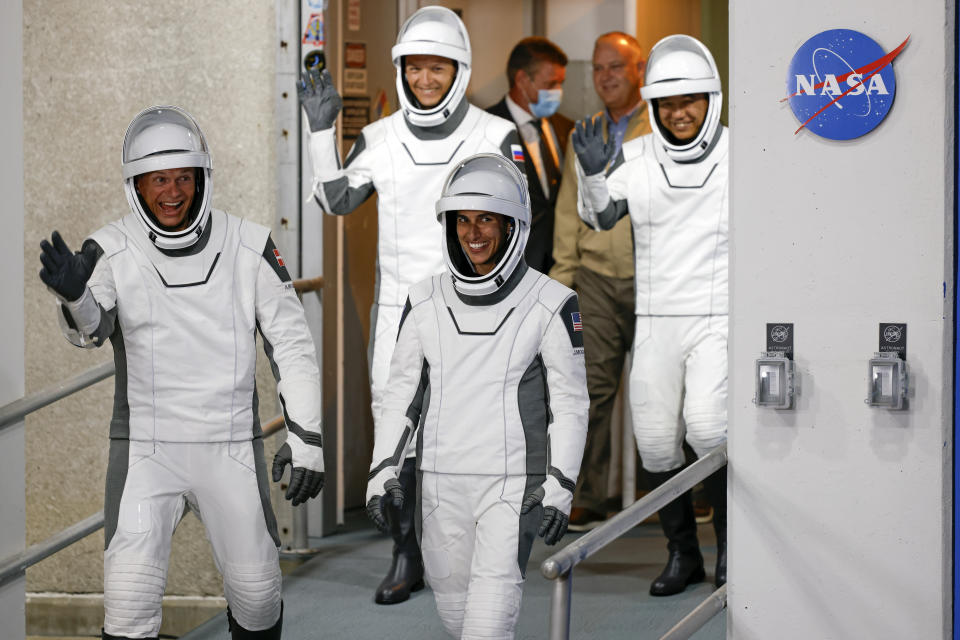 Danish astronaut Andreas Mogensen, left, front, NASA astronaut Jasmin Moghbeli, right front, Russian cosmonaut Konstantin Borisov, bck left, and Japanese astronaut Satoshi Furukawa leave the Operations and Checkout Building before heading to the launch pad to board the SpaceX Falcon 9 rocket on a mission to the International Space Station, at Kennedy Space Center in Cape Canaveral, Fla., Saturday, Aug. 26, 2023. (AP Photo/Terry Renna)