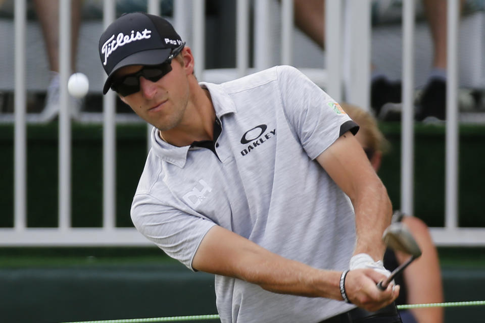 Richy Werenski chips up to the 17th green during the third round of A Military Tribute at The Greenbrier golf tournament in White Sulphur Springs, W.Va., Saturday, Sept. 14, 2019. (AP Photo/Steve Helber)