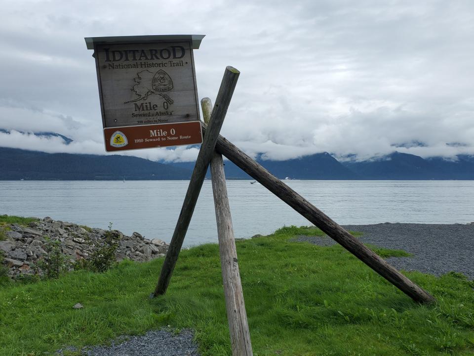 The southern trip of the historic Iditarod Trail, seen on Aug. 27, 2022, is at the edge of Resurrection Bay in Seward. The Alaska Long Trail project envisions this as the southern terminus of a 500-mile trail network stretching north to Fairbanks. (Photo by Yereth Rosen/Alaska Beacon)
