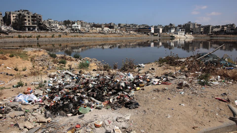 Rubbish accumulates along a non-functioning sewage dump in Gaza City on May 3. - AFP/Getty Images