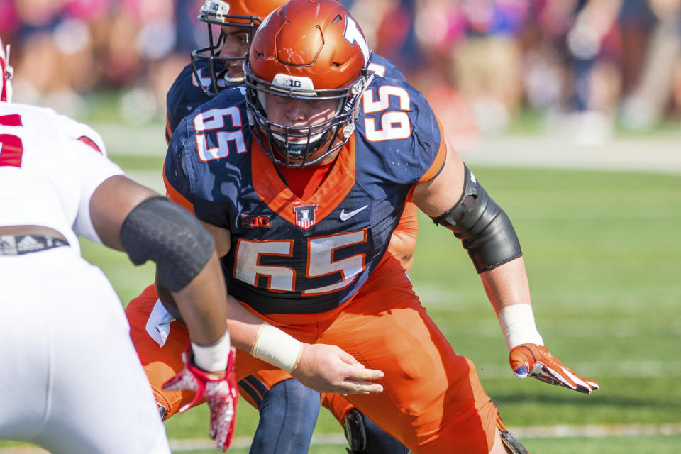 FILE - In this Oct. 14, 2017, file photo, Illinois offensive lineman Doug Kramer (65) blocks during an NCAA college football game against Rutgers in Champaign, Ill. For a program that has not had a winning record since 2011 and has reached the postseason just twice in that time, the hope is that Alex Palczewski, fellow linemen Kramer and Vederian Lowe and the super class will power a long awaited breakthrough in Champaign. (AP Photo/Bradley Leeb, File)