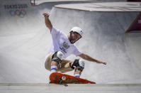 Dallas Oberholzer, 46, from South Africa, takes part in a men's Park Skateboarding training session at the 2020 Summer Olympics, Saturday, July 31, 2021, in Tokyo, Japan. The age-range of competitors in skateboarding's Olympic debut at the Tokyo Games is remarkably broad and 46-year-old Dallas Oberholzer will go wheel-to-wheel with skaters less than half his age. (AP Photo/Ben Curtis)