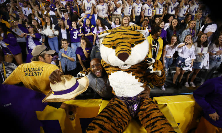 LSU's mascot interacting with fans.