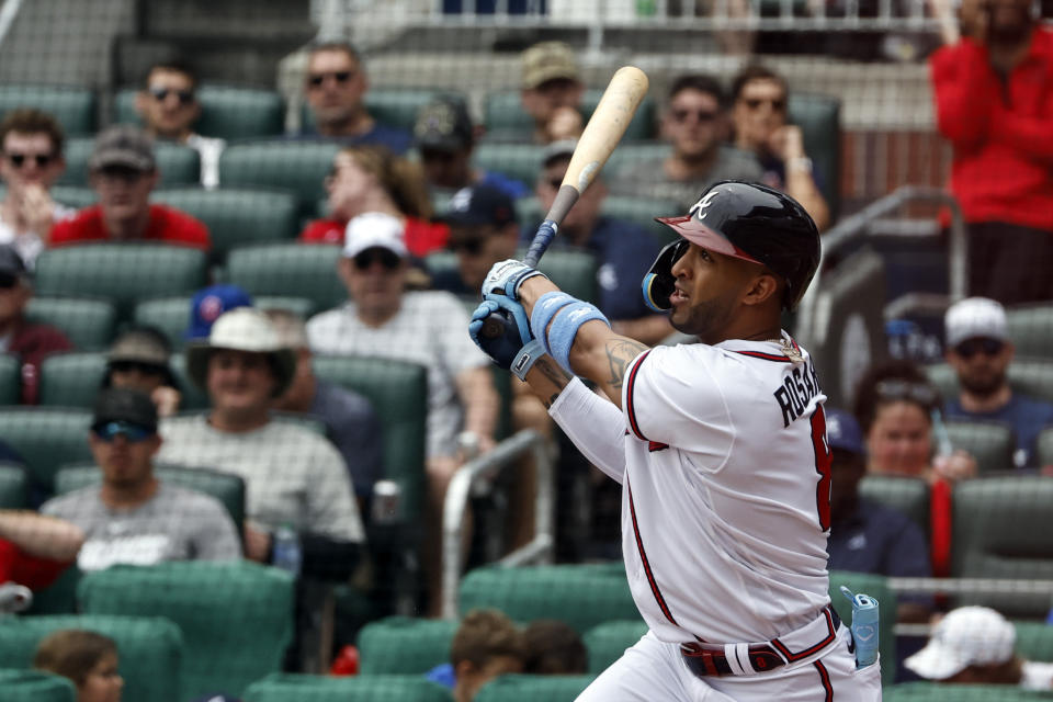 Atlanta Braves' Eddie Rosario hits a three-run home run in the second inning of a baseball game against the Colorado Rockies, Sunday, June 18, 2023, in Atlanta. (AP Photo/Butch Dill)