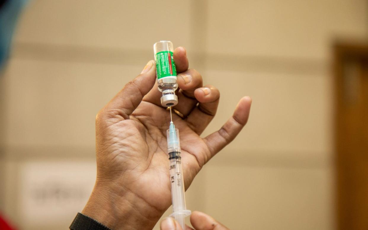 Mandatory Credit: Photo by MONIRUL ALAM/EPA-EFE/Shutterstock (11729277g) A health worker prepares to administer a Oxford-AstraZeneca developed vaccine produced by the Serum Institute of India (SII) during the 2nd day of vaccination campaign at the Bangabandhu Sheikh Mujib Medical University (BSMMU) in Dhaka, 28 January, 2021. According to the Bangladesh Health authority, the vaccination program for Covid-19 on trial has begun at five government hospitals across the Dhaka city. Bangladesh begins Covid-19 vaccination drive at five government hospitals in Dhaka - 28 Jan 2021 - MONIRUL ALAM/EPA-EFE/Shutterstock