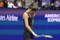 Karolina Pliskova, of the Czech Republic, reacts after missing a shot to Maria Sakkari, of Greece, during the quarterfinals of the U.S. Open tennis tournament Wednesday, Sept. 8, 2021, in New York. (AP Photo/Frank Franklin II)