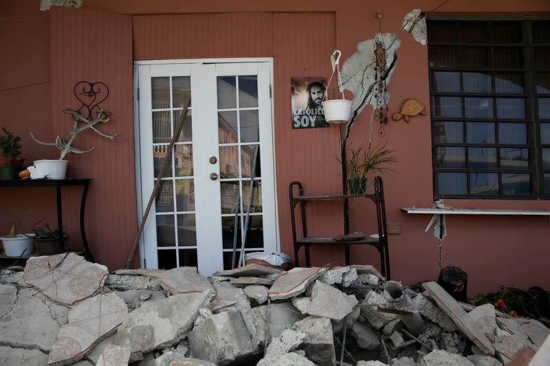 The entrance of a damaged house is seen after an earthquake in Guanica