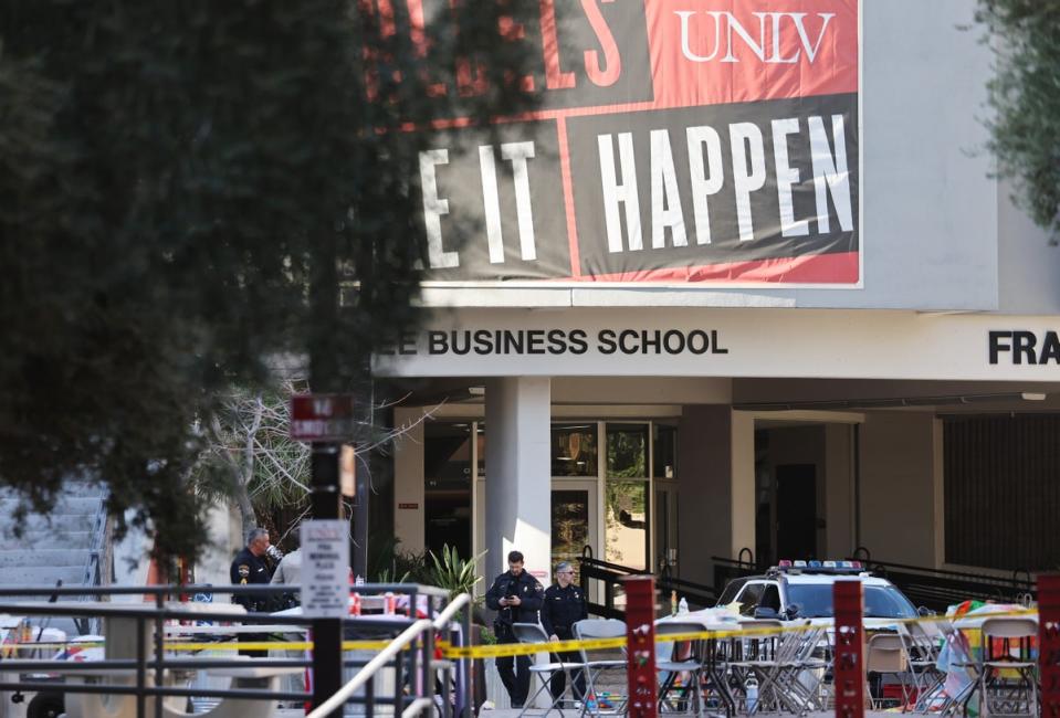 Police officers keep watch near the scene outside Frank and Estella Beam Hall, where the UNLV Lee Business School is located (Getty Images)