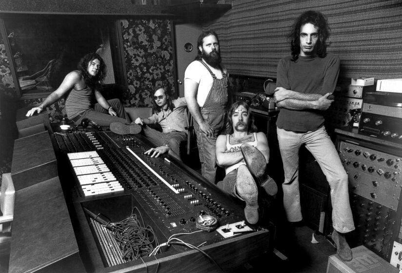 Jim Hodder, Walter Becker, Denny Dias, Jeff "Skunk" Baxter and Donald Fagen of Steely Dan pose for a portrait in 1973.