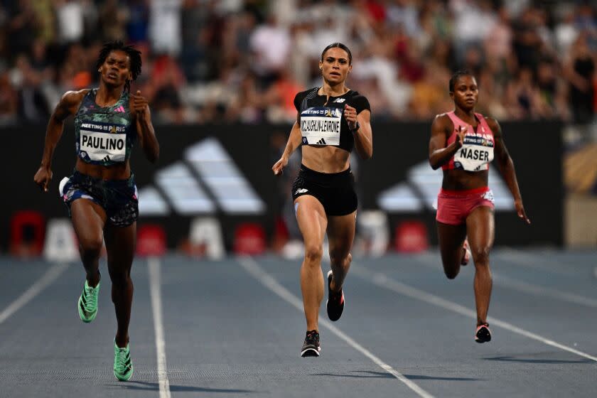 USA&#39;s Sydney McLaughlin-Levrone (C) runs to second place flanked by winner Dominican Republic&#39;s Marileidy Paulino (L) in the women&#39;s 400m event during the IAAF Diamond League &quot;Meeting de Paris&quot; athletics meeting at the Charlety Stadium in Paris on June 9, 2023. (Photo by Jeff PACHOUD / AFP) (Photo by JEFF PACHOUD/AFP via Getty Images)