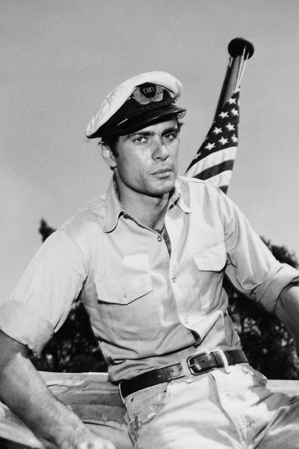 As Captain Adam Troy in Adventures in Paradise.