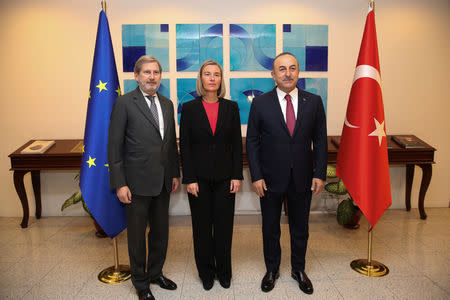 Turkey's Foreign Minister Mevlut Cavusoglu meets with European Union Foreign Policy Chief Federica Mogherini and European Commissioner for European Neighborhood Policy Johannes Hahn in Ankara, Turkey November 22, 2018. Cem Ozdel/Turkish Foreign Ministry/Handout via REUTERS
