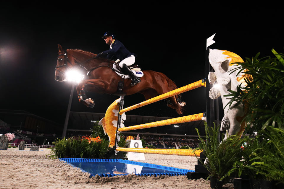 <p>TOKYO, JAPAN - AUGUST 02: Andrew Hoy of Team Australia riding Vassily de Lassos competes during the Eventing Individual Jumping Final on day ten of the Tokyo 2020 Olympic Gamesat Equestrian Park on August 02, 2021 in Tokyo, Japan. (Photo by Julian Finney/Getty Images)</p> 