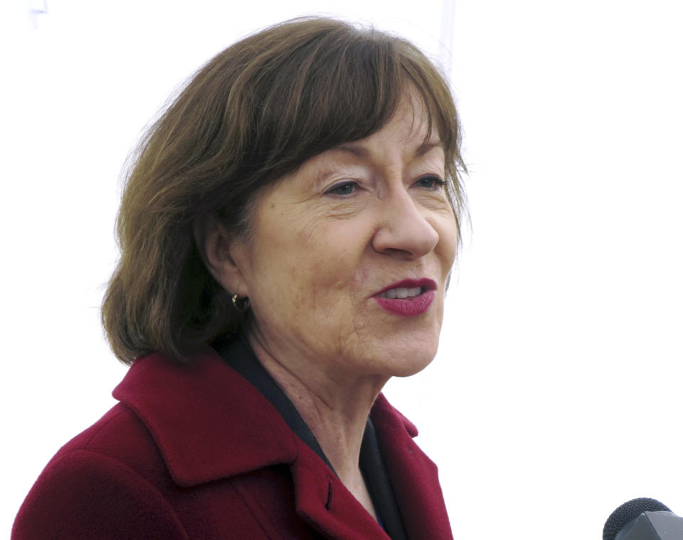 Sen. Susan Collins speaks to the media outside Bath Iron works, where she spoke during a ceremony marking construction of a new warship, Friday, Nov. 9, 2018, in Brunswick, Maine. (AP Photo/David Sharp)