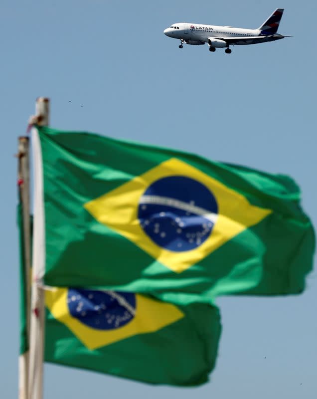 A LATAM Airlines Brasil plane prepares to land at Santos Dumont airport after the coronavirus disease (COVID-19) outbreak, that cancelled many flights in Rio de Janeiro