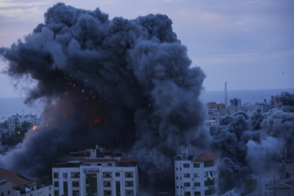 Smoke rises from an explosion caused by an Israeli airstrike in the Gaza Strip, Saturday, Oct. 7, 2023. (AP Photo/Hatem Moussa)