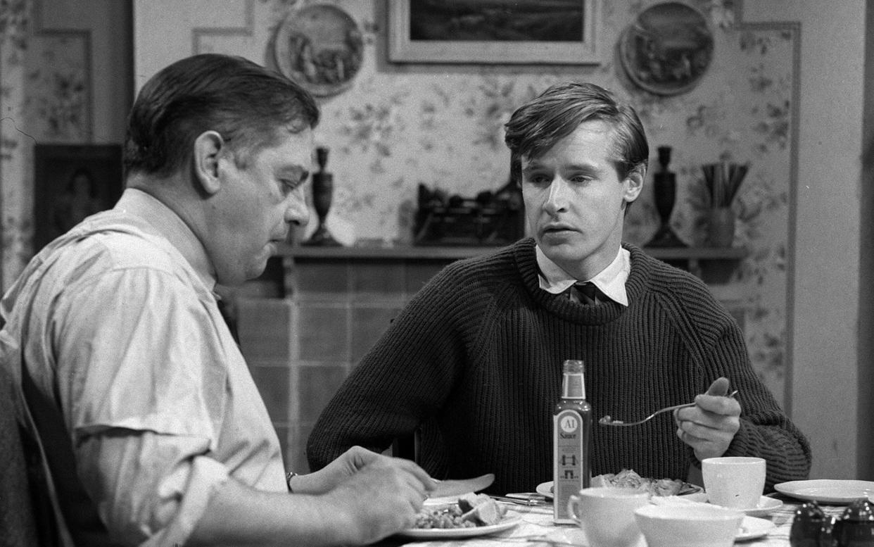 Kenneth Barlow (Bill Roache, r) kicked off Corrie's first episode by coming home a snobbish university student - ITV/Shutterstock