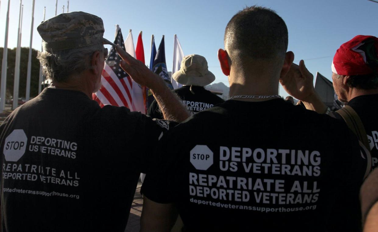 <span class="caption">Mexican-American deported veterans at a Memorial Day ceremony held annually on the bridge that connects Texas to Ciudad Juarez, Mexico, May 28, 2018. </span> <span class="attribution"><a class="link " href="https://www.gettyimages.com.mx/detail/fotografía-de-noticias/mexican-veterans-deported-from-the-united-fotografía-de-noticias/963435876?adppopup=true" rel="nofollow noopener" target="_blank" data-ylk="slk:Herika Martinz/ AFP via Getty Images;elm:context_link;itc:0;sec:content-canvas">Herika Martinz/ AFP via Getty Images</a></span>