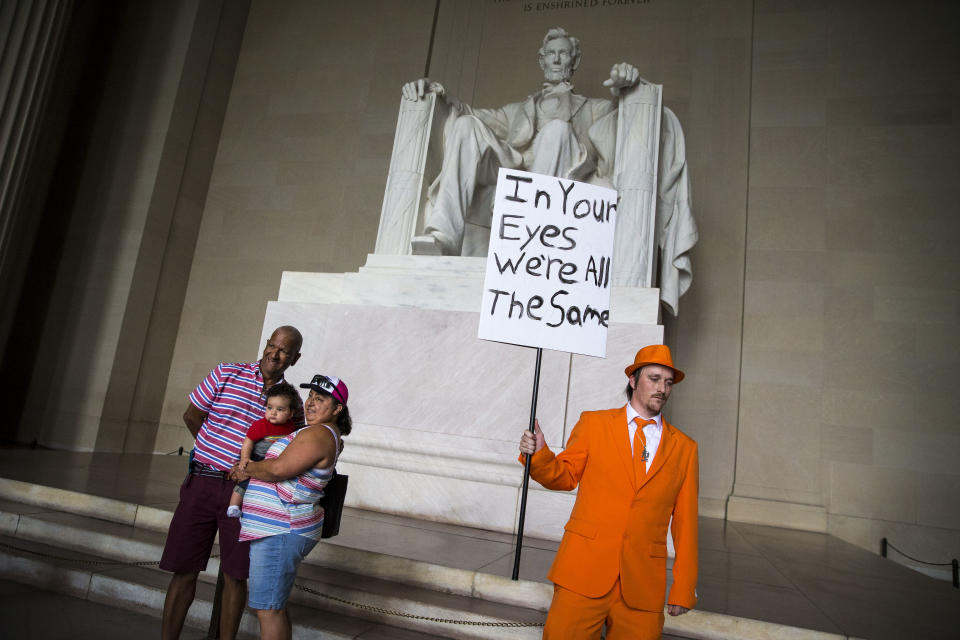 <p>Zach Vance, from Utah County, Utah, poses for a photo in front of the Lincoln Memorial, before the start of the Juggalo March, Sept. 16, 2017 in Washington. (Photo: Al Drago/Getty Images) </p>