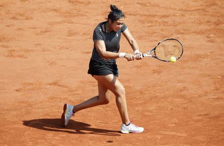 Tennis - French Open - Roland Garros - Simona Halep of Romania v Kazakhstan's Zarina Diyas - Paris, France - 25/05/16. Diyas returns a shot. REUTERS/Jacky Naegelen