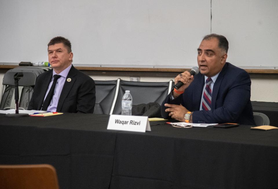 Anthony Silva, left, and Waqar Rivzi participate in a candidates forum for Stockton city council district 2 at San Joaquin Delta College in Stockton on Feb. 7, 2024.