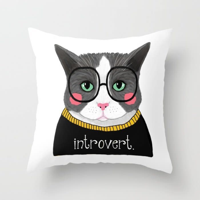 <a href="https://society6.com/product/introvert-cat_pillow#s6-6088388p26a18v126a25v193" target="_blank">Introvert Cat Throw Pillow Cover</a>, $17 on <a href="https://society6.com/" target="_blank">Society6</a>