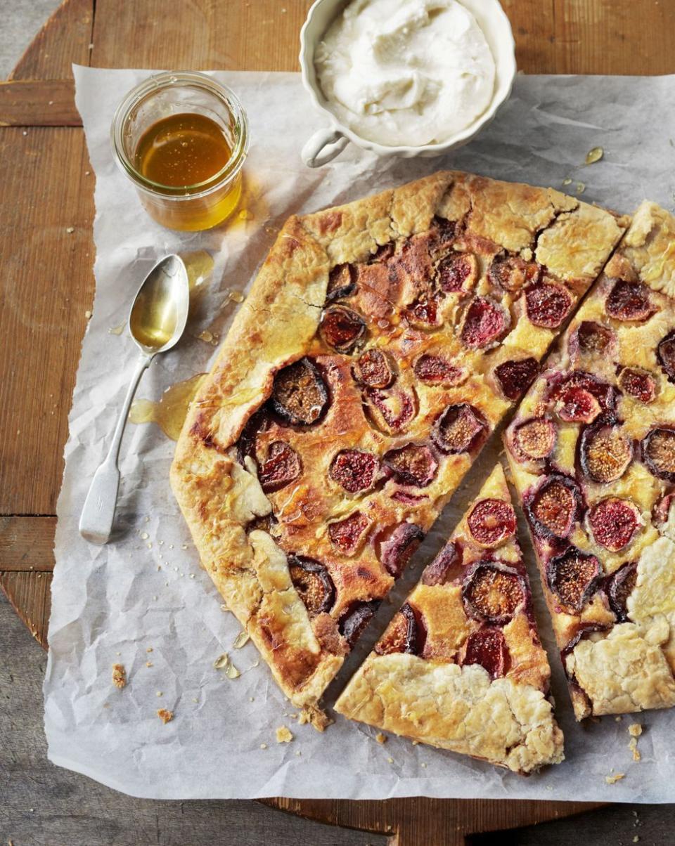 <p>An ultimate trio of sweet honey, creamy ricotta, and fresh figs make this crostata tart the most satisfying snack ever. </p><p><em><a href="https://www.countryliving.com/food-drinks/recipes/a5411/fresh-fig-crostata-ricotta-honey-recipe-clx0714/" rel="nofollow noopener" target="_blank" data-ylk="slk:Get the recipe from Country Living »;elm:context_link;itc:0;sec:content-canvas" class="link ">Get the recipe from Country Living »</a></em> <br></p><p><strong>RELATED: </strong><a href="https://www.goodhousekeeping.com/food-recipes/healthy/g845/healthy-appetizers/" rel="nofollow noopener" target="_blank" data-ylk="slk:33 Easy, Healthy Appetizers That Are Delicious and Filling;elm:context_link;itc:0;sec:content-canvas" class="link ">33 Easy, Healthy Appetizers That Are Delicious and Filling</a></p>