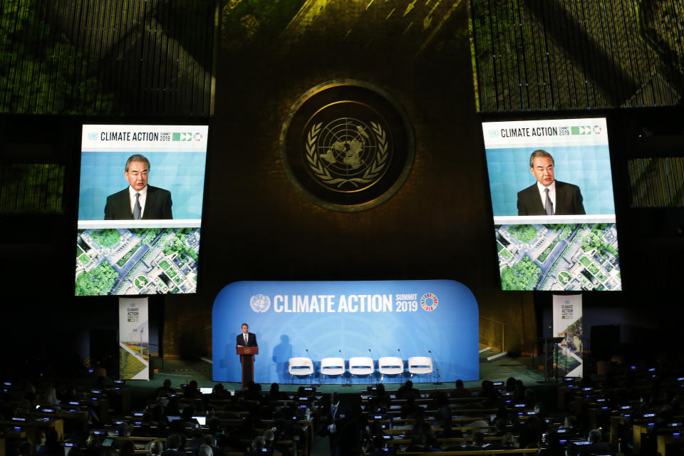 China's Foreign Minister Wang Yi addresses the Climate Action Summit in the United Nations General Assembly, at U.N. headquarters, Monday, Sept. 23, 2019. (AP Photo/Jason DeCrow)