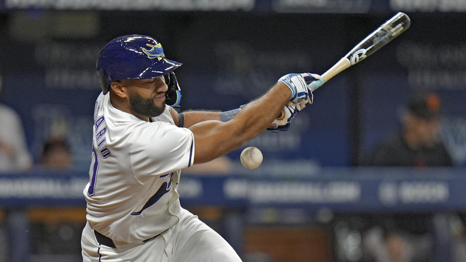 Tampa Bay Rays' Amed Rosario gets hit with a foul ball on a pitch from San Francisco Giants' Keaton Winn during the fifth inning of a baseball game Friday, April 12, 2024, in St. Petersburg, Fla. (AP Photo/Chris O'Meara)