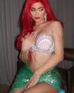 <p>She donned a bright red wig to channel Ariel from <em>The Little Mermaid</em> for Halloween 2019.</p>