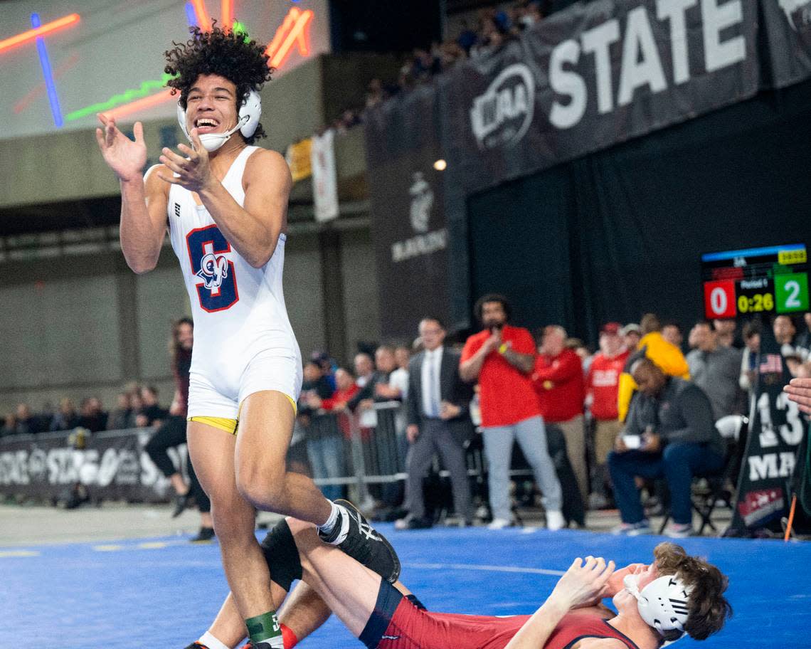 Silas’ Elijah Cater celebrates after pinning Mount Spokane’s Jayson Bonnett in the 126-pound, Class 3A championship match at Mat Classic XXXIV on Saturday, Feb. 18, 2023, at the Tacoma Dome in Tacoma, Wash. Cater pinned Bonnett in 1 minute, 34 seconds.