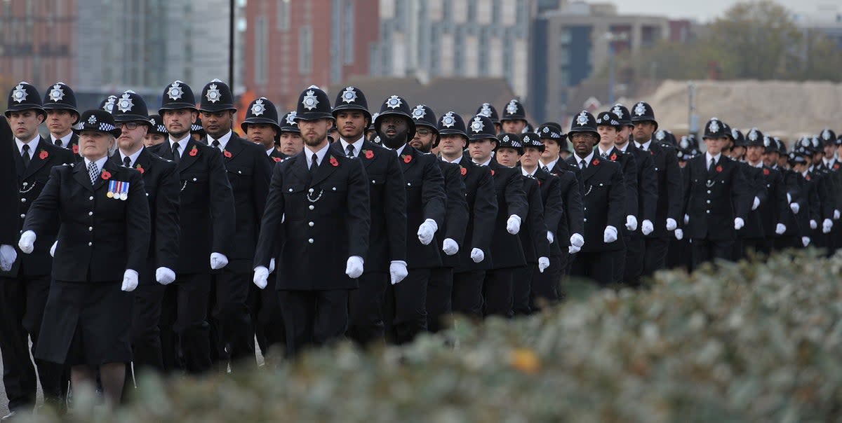 Metropolitan Police recruits marching during a Metropolitan Police passing out parade for new officers at Peel House in Hendon (Nick Ansell/PA) (PA Archive)