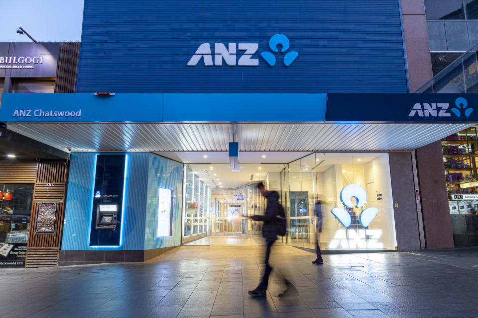 Sydney, Australia - September 12, 2019:  A pedestrian walks past a retail branch of Australia and New Zealand Banking Group (ANZ) in Chatswood, Australia on September 12, 2019.  ANZ is currently the sixth largest Australian company and fourth largest financial institution listed on the Australian Securities Exchange, as of September 2019. The bank is one of the 