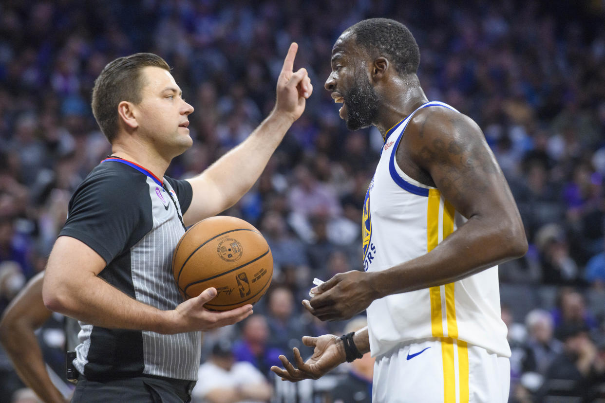 Draymond Green was suspended for Game 3 after he stomped on Kings forward Domantas Sabonis in Game 2. (AP Photo/Randall Benton)
