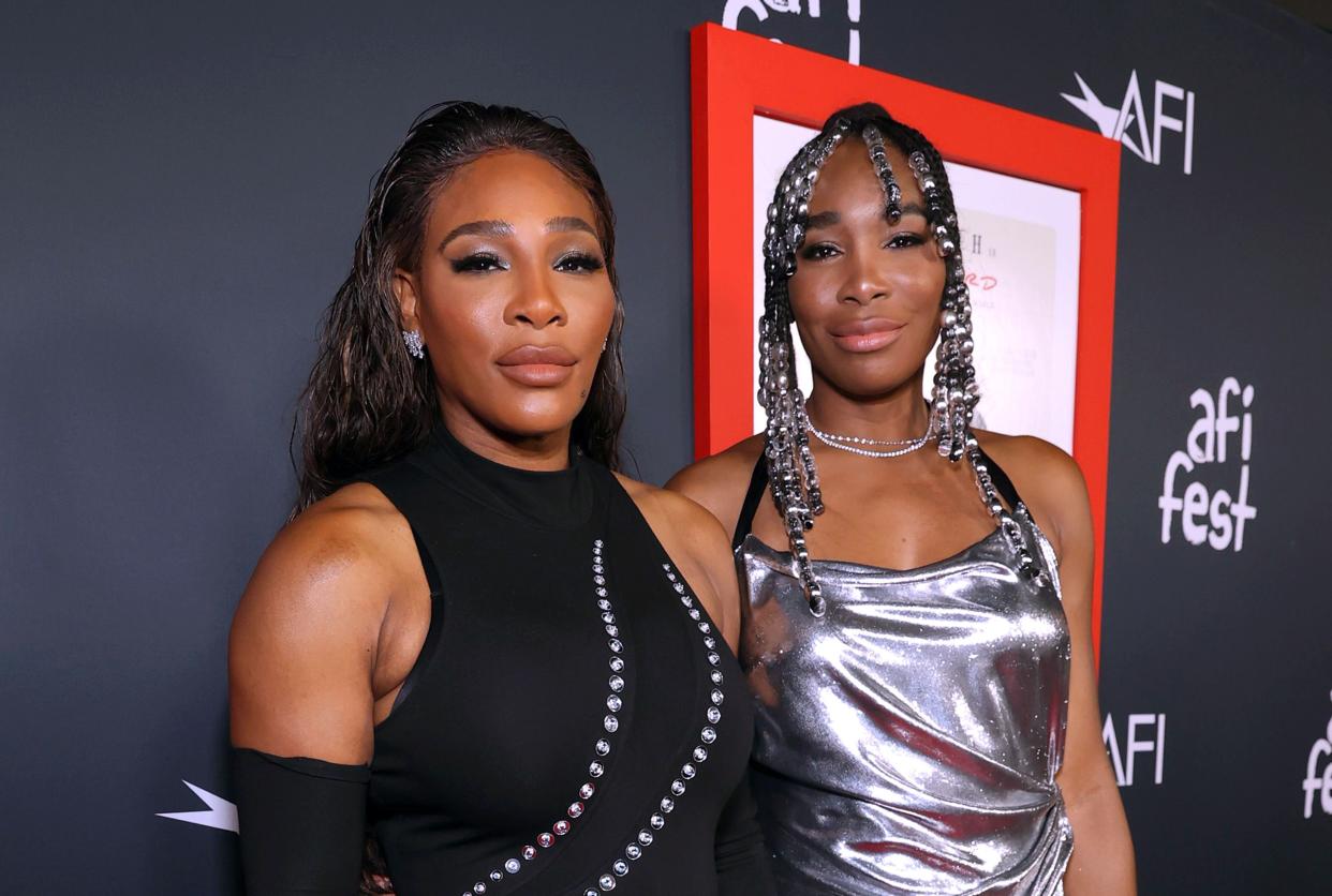 HOLLYWOOD, CALIFORNIA - NOVEMBER 14: (L-R) Serena and Venus Williams attend the 2021 AFI Fest Closing Night Premiere of Warner Bros. 