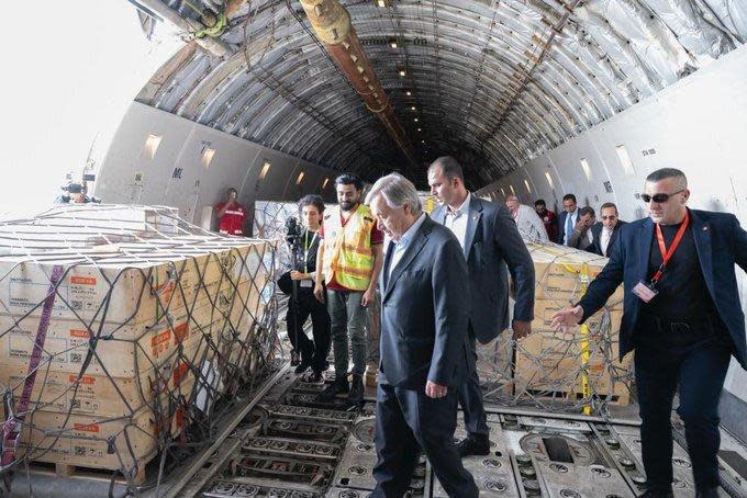 U.N. Secretary-General Antonio Guterres (center) inspects aid materials waiting to be moved across the Rafah crossing from Egypt into the Gaza Strip, Oct. 20, 2023.  / Credit: Handout/UN Photo/Eskinder Debebe