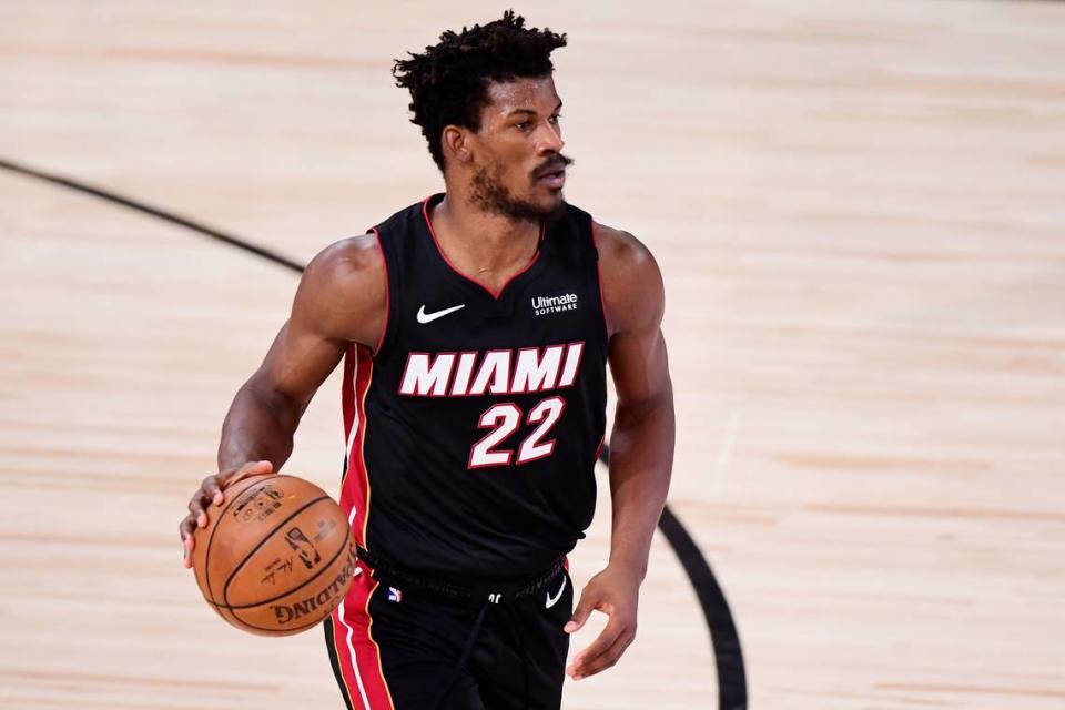Jimmy Butler #22 of the Miami Heat controls the ball against the Los Angeles Lakers in the third quarter of Game 6 of the 2020 NBA Finals at AdventHealth Arena at the ESPN Wide World Of Sports Complex on Oct. 11, 2020 in Lake Buena Vista.